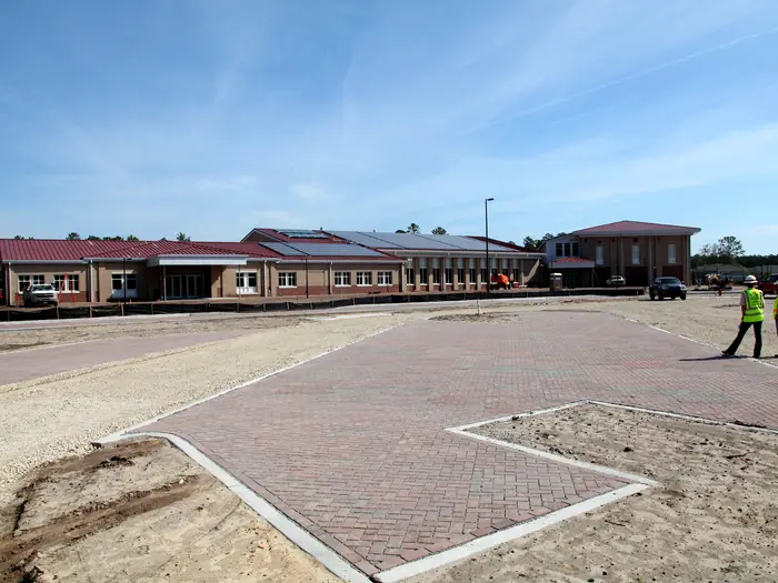 Solar panels installed on the rooftop of a school building